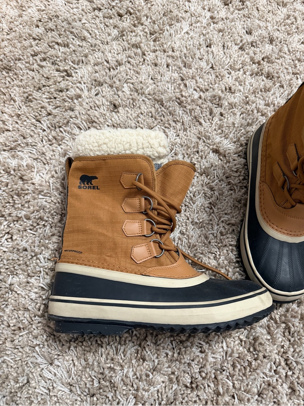 Sorel Women's Waterproof Winter Boot in Brown and Black with Sherpa Cuff